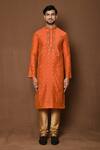 Shop_Aryavir Malhotra_Orange Kurta Raw Silk Embroidered Threadwork Patterned With Contrast Churidar_Online_at_Aza_Fashions