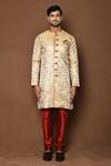 Shop_Aryavir Malhotra_Beige Sherwani Raw Silk Floral Blooming Pattern With Churidar _Online_at_Aza_Fashions