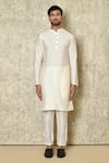 Shop_Naintara Bajaj_Orange Bandhgala Cotton Linen Plain Asymmetric Placket Kurta Set_Online_at_Aza_Fashions