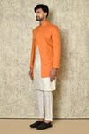 Shop_Naintara Bajaj_Orange Bandhgala Cotton Linen Plain Asymmetric Placket Kurta Set