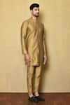 Naintara Bajaj_Gold Cotton Silk Plain Mandarin Collar Kurta_at_Aza_Fashions