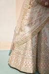 Angad Singh_Ivory Raw Silk Embroidery Zardozi Leaf Neck Cutdana Bridal Lehenga Set _at_Aza_Fashions