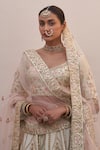 Buy_Angad Singh_Ivory Raw Silk Embroidered Zardozi Plunge Neck Floral Bridal Lehenga Set_Online_at_Aza_Fashions