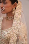 Shop_Angad Singh_Ivory Raw Silk Embroidered Zardozi Plunge Neck Floral Bridal Lehenga Set_Online_at_Aza_Fashions