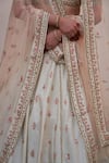 Shop_Angad Singh_Ivory Raw Silk Embroidery Zardozi Leaf Neck Floral Bridal Lehenga Set _Online_at_Aza_Fashions