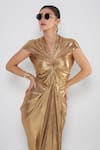 Cham Cham_Gold Stretch Knit Foil Plain V Neck Pleated Draped Sleeve Gown For Women_Online_at_Aza_Fashions