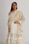 Megha Bansal_Ivory Tulle, Chiffon, Churidar Cotton Silk, Hans Embroidered Anarkali Set _at_Aza_Fashions
