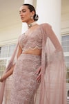 Shop_Charu and Vasundhara_Pink Net Embroidery Sequin Cape Open Siona Scallop Fish Cut Lehenga Set _Online_at_Aza_Fashions