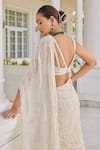 Buy_Charu and Vasundhara_Ivory Blouse Silk Embroidery Bead Leaf Neck Soha Tiered Lehenga Saree With _Online_at_Aza_Fashions