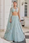 Charu and Vasundhara_Blue Net Embroidery Sequin Leaf Neck Stasia Diamond Pattern Bridal Lehenga Set _Online_at_Aza_Fashions