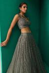 Rishi And Soujit_Green Raw Silk Embroidery Mirror Embellished Lehenga And Blouse Set  _Online_at_Aza_Fashions
