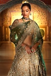 Shop_Seema Gujral_Gold Organza Embroidered Zardozi Leaf Neck Bridal Lehenga Set _at_Aza_Fashions