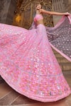 Shop_Seema Gujral_Pink Net Embroidery Sequin Sweetheart Neon Work Bridal Lehenga Set _Online_at_Aza_Fashions