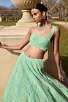 Buy_Seema Gujral_Green Net Embroidery Sequin One Shoulder Blouse And Lehenga Set _Online_at_Aza_Fashions