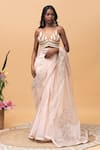 Rishi and Vibhuti_Pink Organza Embroidery Thread Sweetheart Millie Floral Saree With Bralette _at_Aza_Fashions