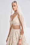 Seema Gujral_Cream Organza Embroidery Sequin Leaf Neck Floral Bridal Lehenga Set  _Online_at_Aza_Fashions