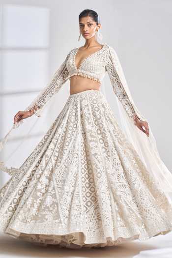 BEIGE NET EMBROIDERED LEHENGA WITH PEPLUM JACKET