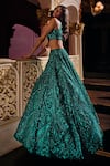 Seema Gujral_Green Net Embroidered Sequins One Shoulder Bridal Lehenga Set  _at_Aza_Fashions