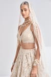 Seema Gujral_Cream Organza Embroidery Sequin Leaf Neck Floral Bridal Lehenga Set  _at_Aza_Fashions