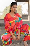 Pooja-Keyur_Multi Cotton Satin Print Splash V Neck Abstract Jumpsuit  _at_Aza_Fashions