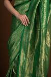 Shop_Devissha_Green Pure Katan Silk Handwoven Paisley Banarasi Saree _at_Aza_Fashions