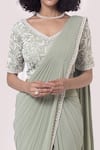 Onaya_Green Lycra Embroidery Pre-draped Lace Trim Saree With Work Blouse _at_Aza_Fashions
