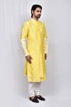 Shop_Arihant Rai Sinha_Yellow Art Silk Patterned Asymmetric Kurta Set_Online_at_Aza_Fashions