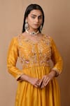 Label Nitisha_Yellow Habutai Silk Embroidered Floral Pattern V Neck Slit Tunic Set _at_Aza_Fashions