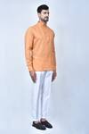 Khwaab by Sanjana Lakhani_Orange Kurta Cotton Plain Pleated Placket Set_at_Aza_Fashions