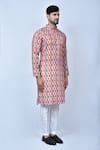 Shop_Arihant Rai Sinha_Orange Kurta Cotton Silk Printed Ikat Patterns And Pant Set _Online_at_Aza_Fashions