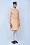 Khwaab by Sanjana Lakhani_Orange Kurta Linen Woven Thread Mughal Pattern Set_at_Aza_Fashions