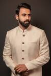 Buy_Darshika Menswear_Beige Silk Embroidery Textured Pattern Long Bandhgala Set_Online_at_Aza_Fashions