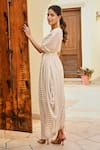 Palak & Mehak_Ivory Gerogette Lurex Embroidery Ziva Asymmetric Stripe Pattern Dress With Belt _at_Aza_Fashions