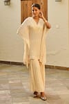 Palak & Mehak_Ivory Rayon Crepe Lurex Gota Stripe V Neck Mira Kaftan Top With Sharara _Online_at_Aza_Fashions