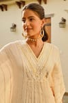 Palak & Mehak_Ivory Rayon Crepe Lurex Gota Stripe V Neck Mira Kaftan Top With Sharara _at_Aza_Fashions