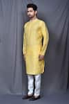 Arihant Rai Sinha_Yellow Kurta Silk Blend Plain And Cream Pant Set _at_Aza_Fashions