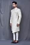 Arihant Rai Sinha_Cream Sherwani Silk Blend Based Jacquard Asymmetric Set _at_Aza_Fashions