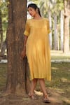 Dhaari_Yellow Handwoven Cotton Silk Hand Smocked Round Dress _Online_at_Aza_Fashions