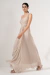 Buy_AMRTA by GUNEET KONDAL_Off White Shell- 100% Viscose Georgette Plunge Neck Hand Beaded Gown _Online_at_Aza_Fashions