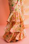 Drishti & Zahabia Peach Silk Pearls, Sequins, Botanical Print Pre-draped Ruffle Saree With Blouse at Aza Fashions Drishti & Zahabia_Peach Silk Pearls, Sequins, Botanical Print Pre-draped Ruffle Saree With Blouse_at_Aza_Fashions