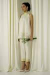 Shop Sakshi Khetterpal Ivory Chanderi Pearls, Beads, Embroidery Halter Neck Top And Pant Set Online at Aza Fashions Shop_Sakshi Khetterpal_Ivory Chanderi Pearls, Beads, Embroidery Halter Neck Top And Pant Set _Online_at_Aza_Fashions