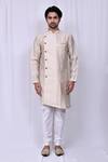 Nazaakat by Samara Singh_Beige Art Silk Jacquard Floral Woven Kurta And Churidar Set_Online_at_Aza_Fashions