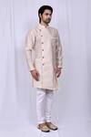 Buy_Nazaakat by Samara Singh_Beige Art Silk Jacquard Floral Woven Kurta And Churidar Set_Online_at_Aza_Fashions