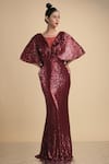 Buy_Kommal Sood_Maroon Lycra Stretch Net Embroidered Sequins Cape Sleeve Gown  _Online_at_Aza_Fashions