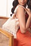 Forever Noor_Peach Embellished Paisley Handcrafted Potli Bag _Online_at_Aza_Fashions