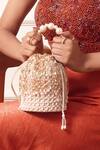 Forever Noor_Peach Embellished Paisley Handcrafted Bucket Bag _Online_at_Aza_Fashions