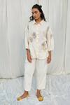 Ayaka White Cotton Embroidery Collared Flower Applique Shirt at Aza Fashions Ayaka_White Cotton Embroidery Collared Flower Applique Shirt _at_Aza_Fashions