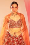 Silky Bindra_Orange Net Embroidery Floral Sweetheart Neck Flower Vine Lehenga Set _Online_at_Aza_Fashions