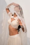 Nayna Kapoor_Ivory Georgette Embellished Cutdana Flower Sequin Bridal Lehenga Set _Online_at_Aza_Fashions