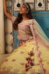 Buy_XOXO Apurva_Yellow Satin Organza Embroidered Floral Boat Carnival Lehenga Set  _Online_at_Aza_Fashions